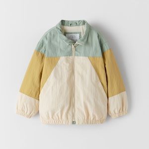 Zara Contrasting technical fabric raincoat